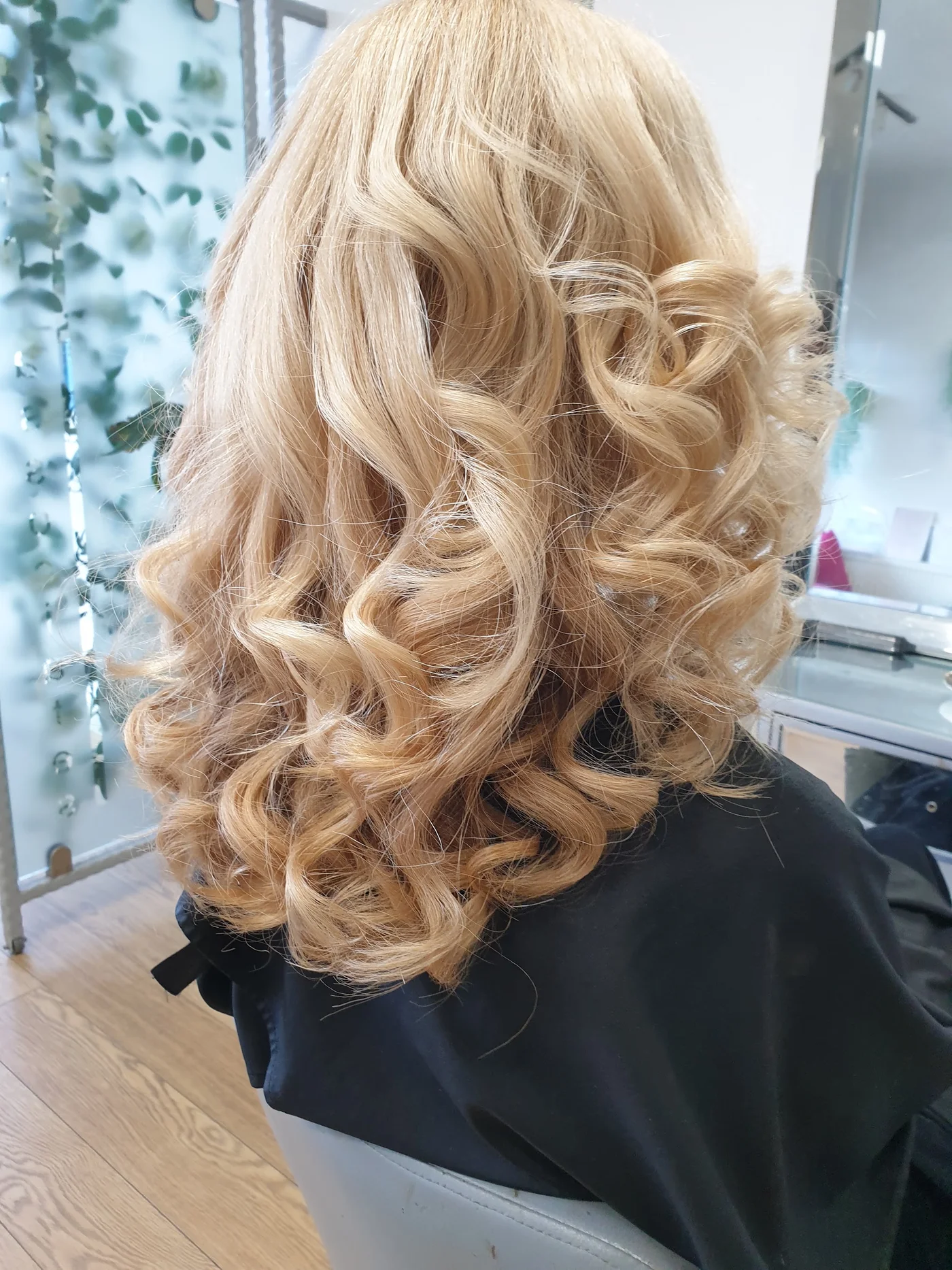 Soft blonde curls photographed at Lee and Friends salon